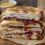APPLEWOOD SMOKED TURKEY MELT W/ CRANBERRY WHISKEY SAUCE